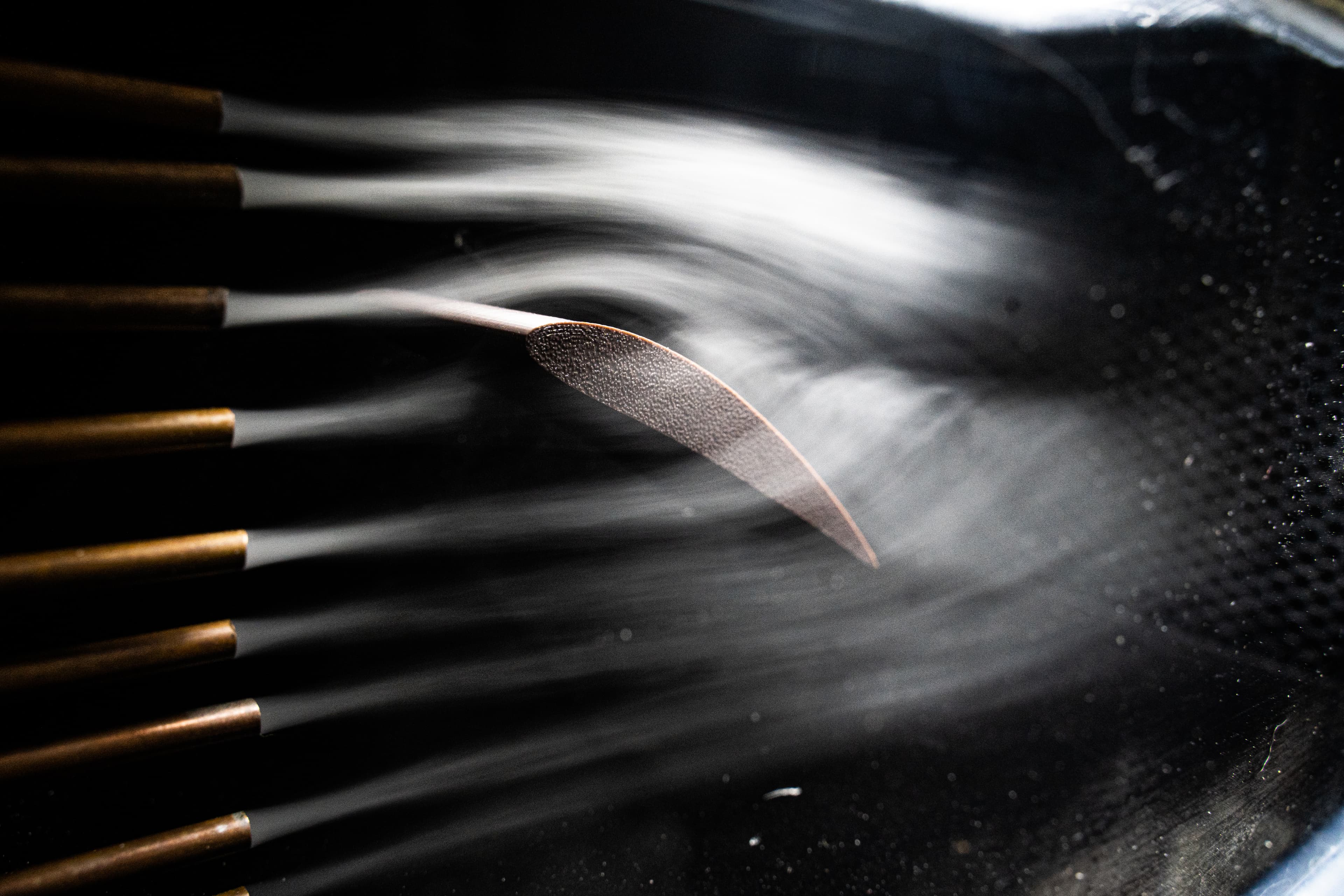 Small scale subsonic wind tunnel CAD, fabricated parts, and smoke visualization photos