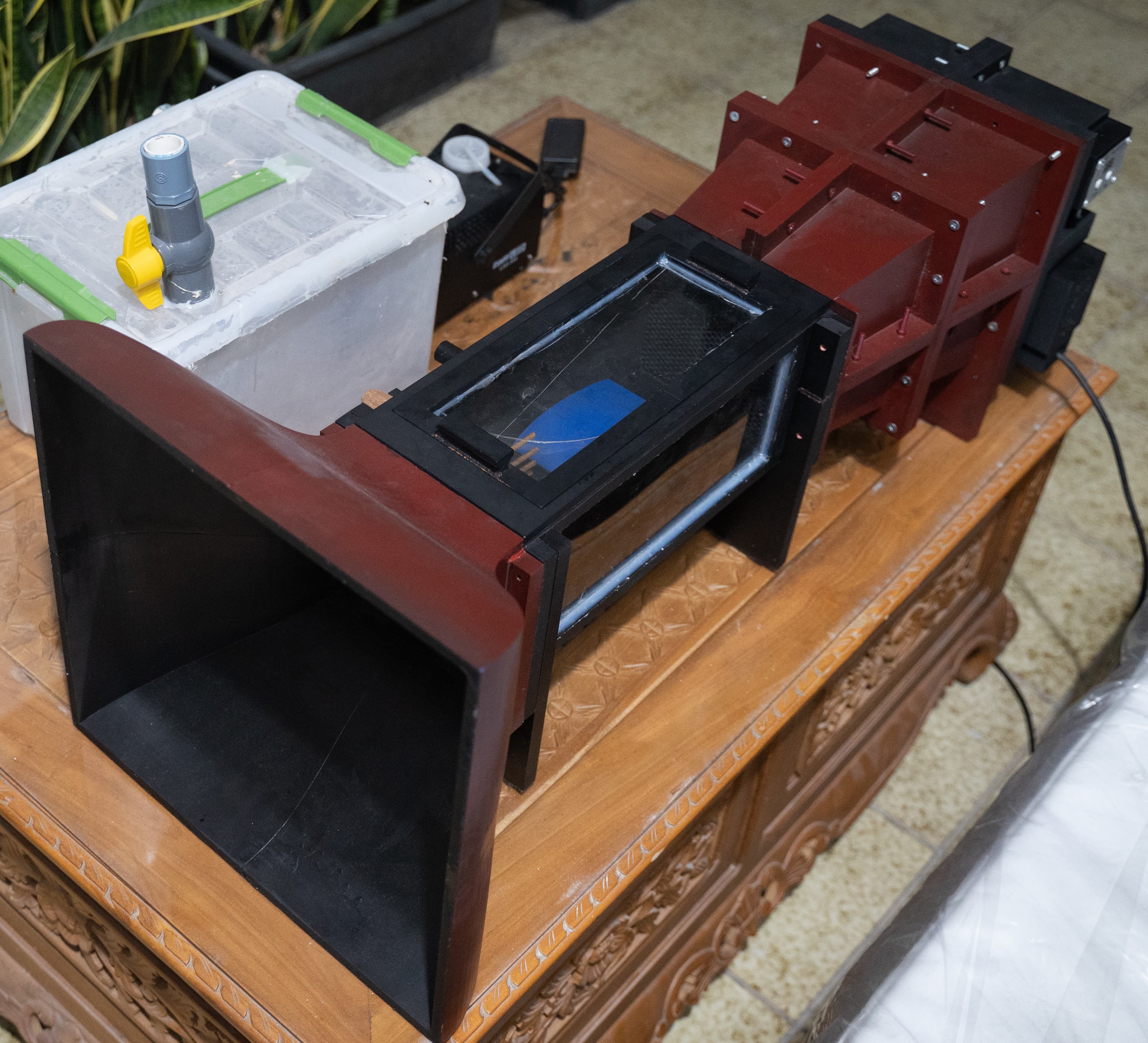 Small scale subsonic wind tunnel CAD, fabricated parts, and smoke visualization photos